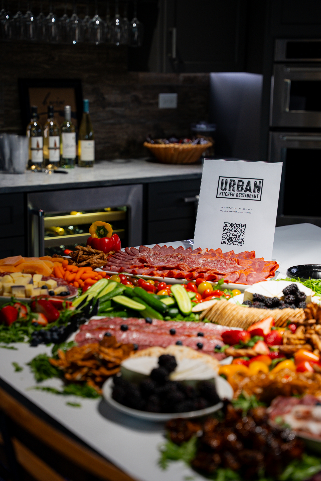A catering spread of fresh food on a long table